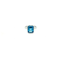 Emerald Cut Blue Topaz Solitaire Ring in White Gold Finish Sterling Silver