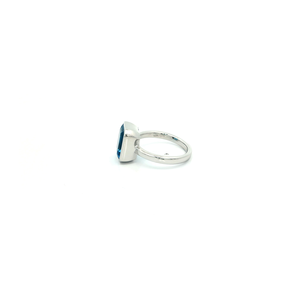 Emerald Cut Blue Topaz Solitaire Ring in White Gold Finish Sterling Silver