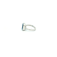 Emerald Cut Blue Topaz Solitaire Ring in White Gold Finish Sterling Silver