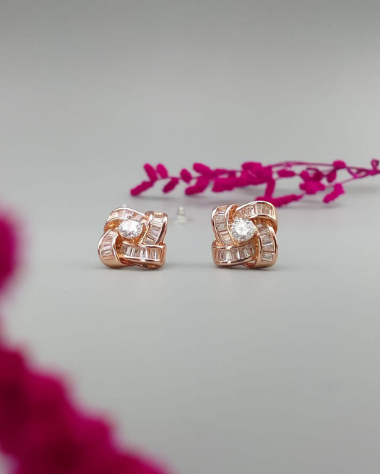 Radiant Silver Stone Golden Studs Earrings: Timeless Glamour in Every Detail